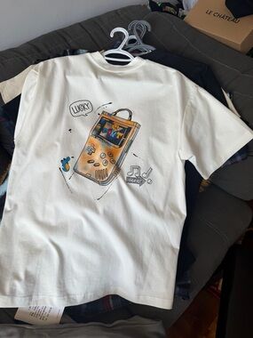 Cream Graphic Tee with Vintage Game Console Print